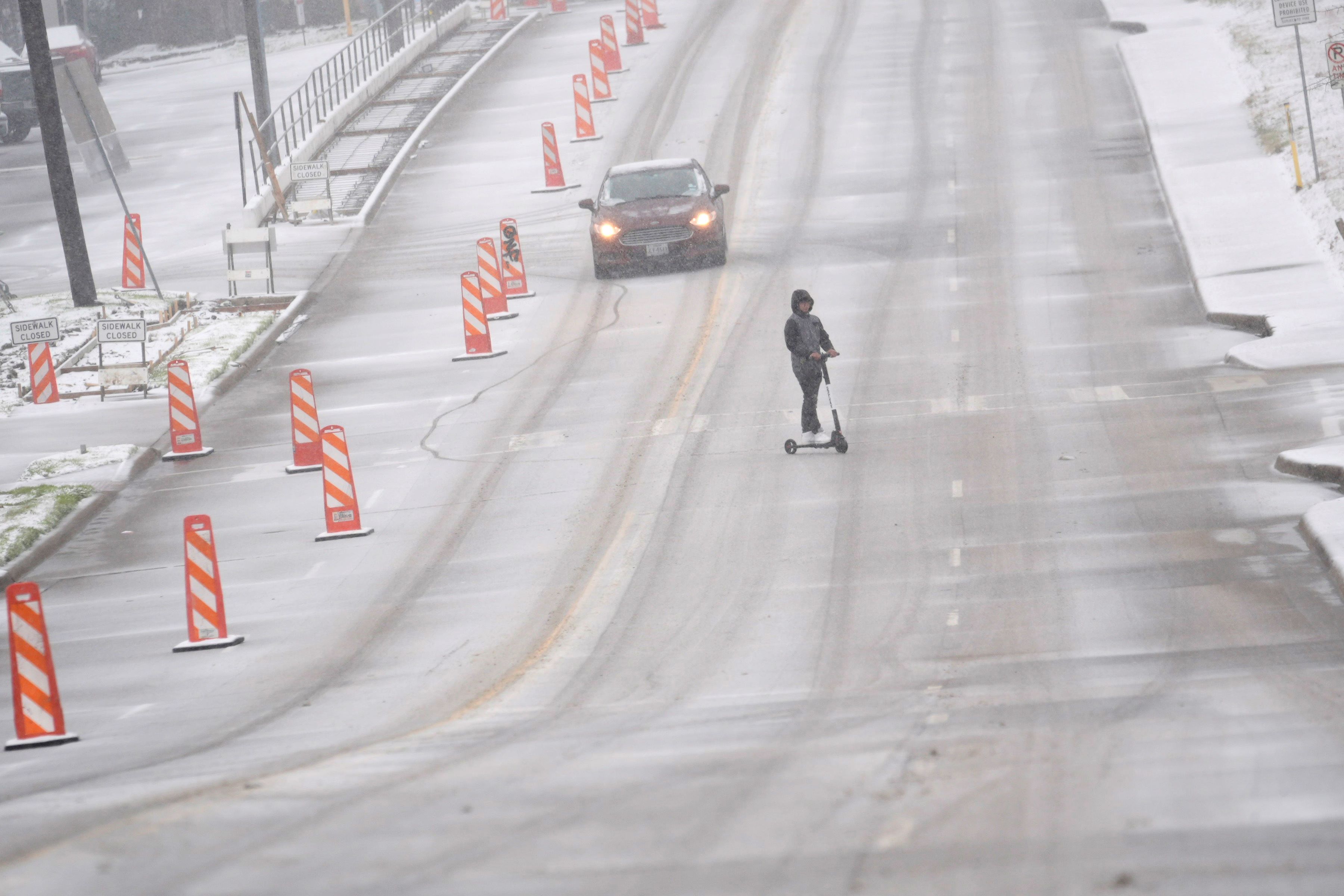 Winter Storm Plods Into Deep South, Prompting States of Emergency and