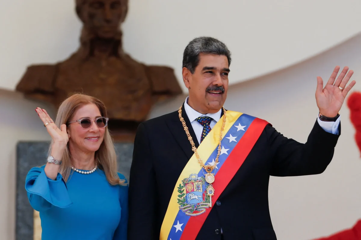 President Nicolas Maduro And His Wife Cilia Flores React On The Day Of His Inauguration For A Third Six-year Term In Caracas