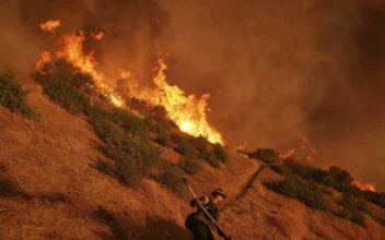 16 Dead, 16 Missing as Fire Crews Try to Corral Los Angeles Blazes Before Winds Return This Week