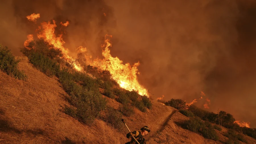 16 Dead, 16 Missing as Fire Crews Try to Corral Los Angeles Blazes Before Winds Return This Week