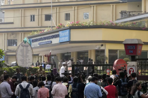 Police and media personnel outside Lilavati hospital where Bollywood actor Saif Ali Khan underwent surgery for stab injuries after a scuffle with an intruder at his home in Mumbai on Jan. 16, 2025. (Rajanish Kakade/AP Photo)