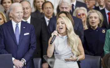 Country singer Carrie Underwood (C) performs 'America the Beautiful' as former President Joe Biden (L) looks on during President Donald Trump's inauguration ceremony in the rotunda of the U.S. Capitol in Washington on Jan. 20, 2025. (Shawn Thew-Pool/Getty Images)
