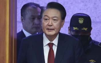 Impeached South Korean President Yoon Suk Yeol arrives for his impeachment trial at the Constitutional Court in Seoul, South Korea, on Jan. 21, 2025. (Kim Hong-Ji/Pool Photo via AP)