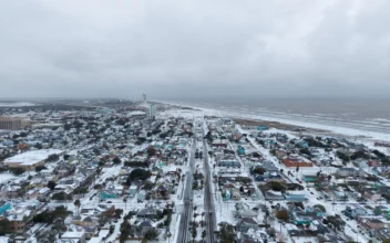 Snow over Galveston Tx on the morning of Jan. 21, 2025. (Michael Grimes/409 Dronegraphy via AP)
