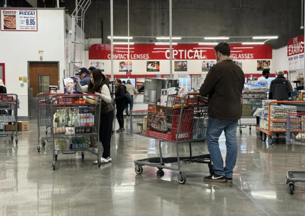 Customers wait in line to check out at a Costco store in Novato, Calif., on Dec. 11, 2024. (Justin Sullivan/Getty Images)