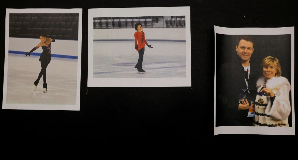Photographs of skaters Jinna Han and Spencer Lane, and coaches Vadim Naumov and Evgenia Shishkova, all of whom died in the crash of American Eagle flight 5342 in Washington, are displayed at the Skating Club of Boston in Norwood, Mass., on Jan. 30, 2025. (Brian Snyder/Reuters)