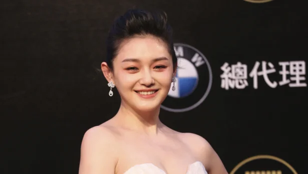 Taiwanese actress Barbie Hsu smiles during an event to promote her new movie "Future X-Cops," in Taipei, Taiwan, on March 29, 2010. (Chiang Ying-ying/AP Photo)