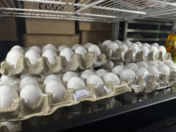 Cartons of eggs sit inside cooler at Norma's Sweets Bakery in New Orleans on Feb. 11, 2025. (Stephen Smith/AP Photo)