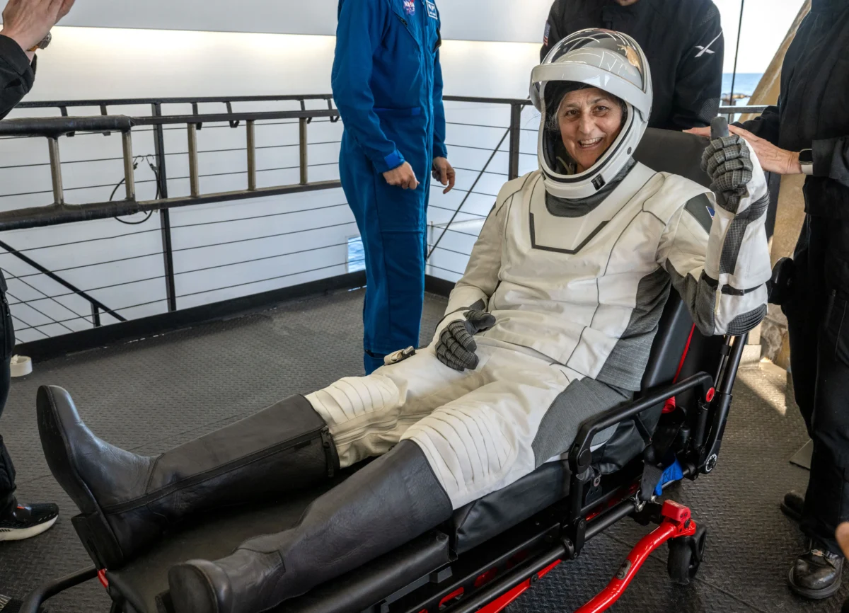 NASA astronaut Suni Williams is helped out of a SpaceX Dragon spacecraft onboard the SpaceX recovery ship MEGAN after she, NASA astronaut Nick Hague, and Butch Wilmore, and Roscosmos cosmonaut Aleksandr Gorbunov landed in the water off the coast of Tallahassee, Fla., on March 18, 2025. (Keegan Barber/NASA via Getty Images)