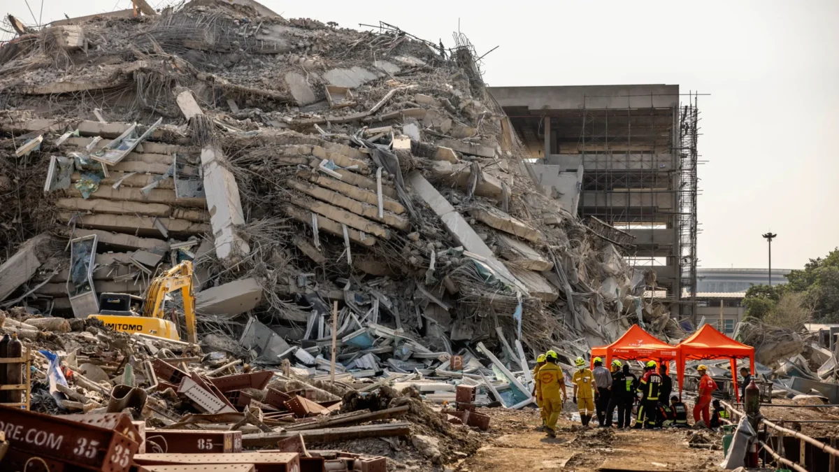 Thai rescue workers arrive on scene at a construction building collapse in the Chatuchak area following an earthquake, in Bangkok, Thailand, on March 28, 2025. (Lauren DeCicca/Getty Images)