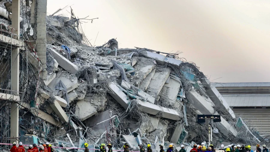 Rescue Workers Search for Survivors After Building Collapse in Bangkok