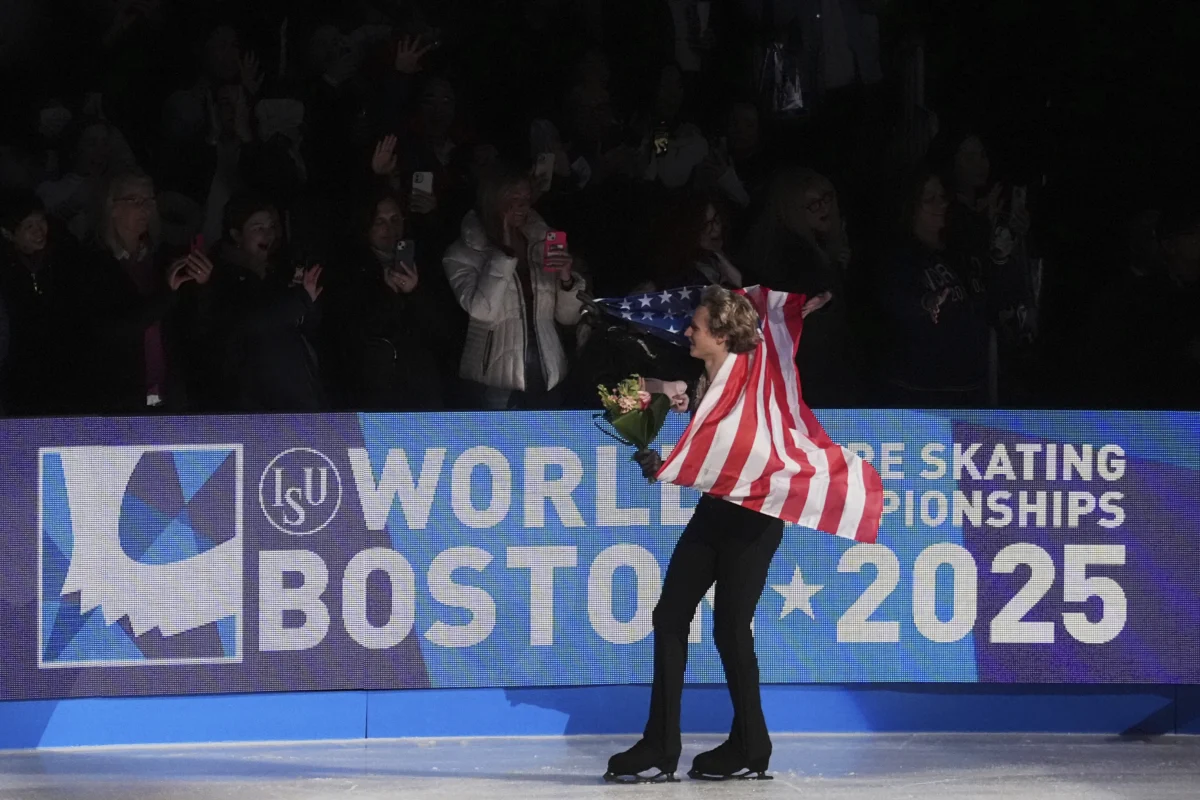 Gold medalist Ilia Malinin of the United States celebrates during a medal ceremony for men's free skating at the figure skating world championships in Boston on March 29, 2025. (Charles Krupa/AP Photo)