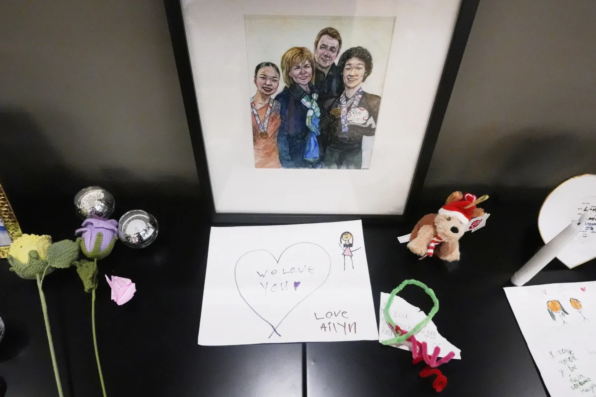 Photographs, flowers, and remembrances are displayed for the six athletes, coaches, and family members who perished in a plane crash in January, at The Skating Club of Boston, in Norwood, Mass, on March 25, 2025, (Charles Krupa/AP Photo)