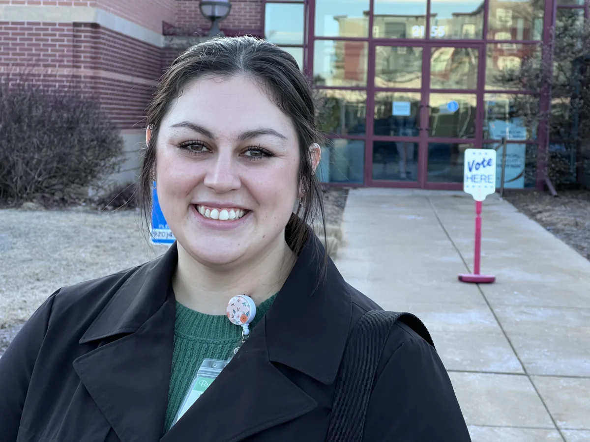 Courtney Koslowski, 28, of appears outside the village hall after voting in Ashwaubenon, Wis., on April 1, 2025. (Lawrence Wilson/The Epoch Times)