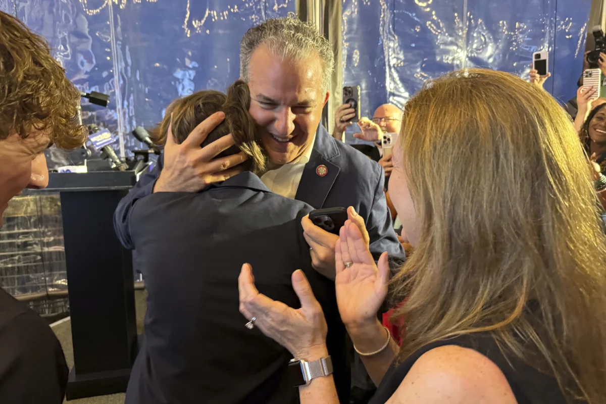 Republican Jimmy Patronis is congratulated during an election night watch party in Pensacola, Fla., on April 1, 2025. (Kate Payne/AP Photo)