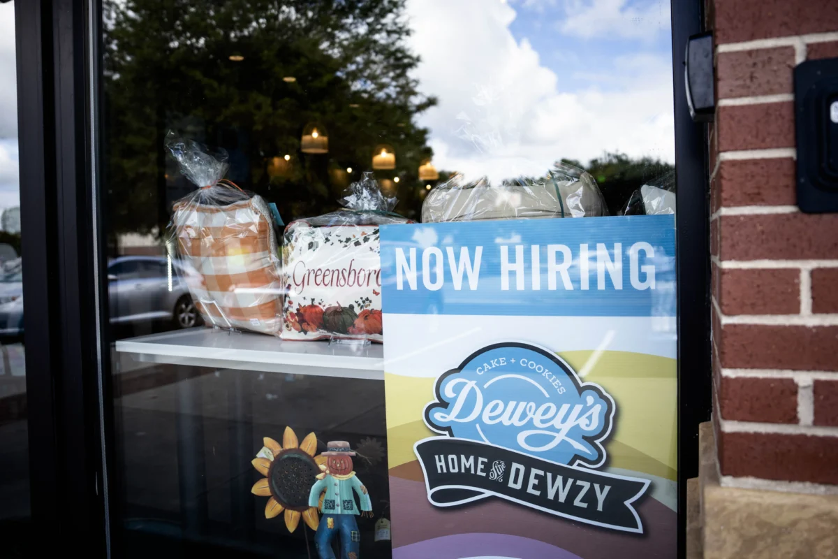 A 'Now Hiring' sign at a coffee shop in Greensboro, N.C., on Sept. 19, 2024. (Madalina Vasiliu/The Epoch Times)