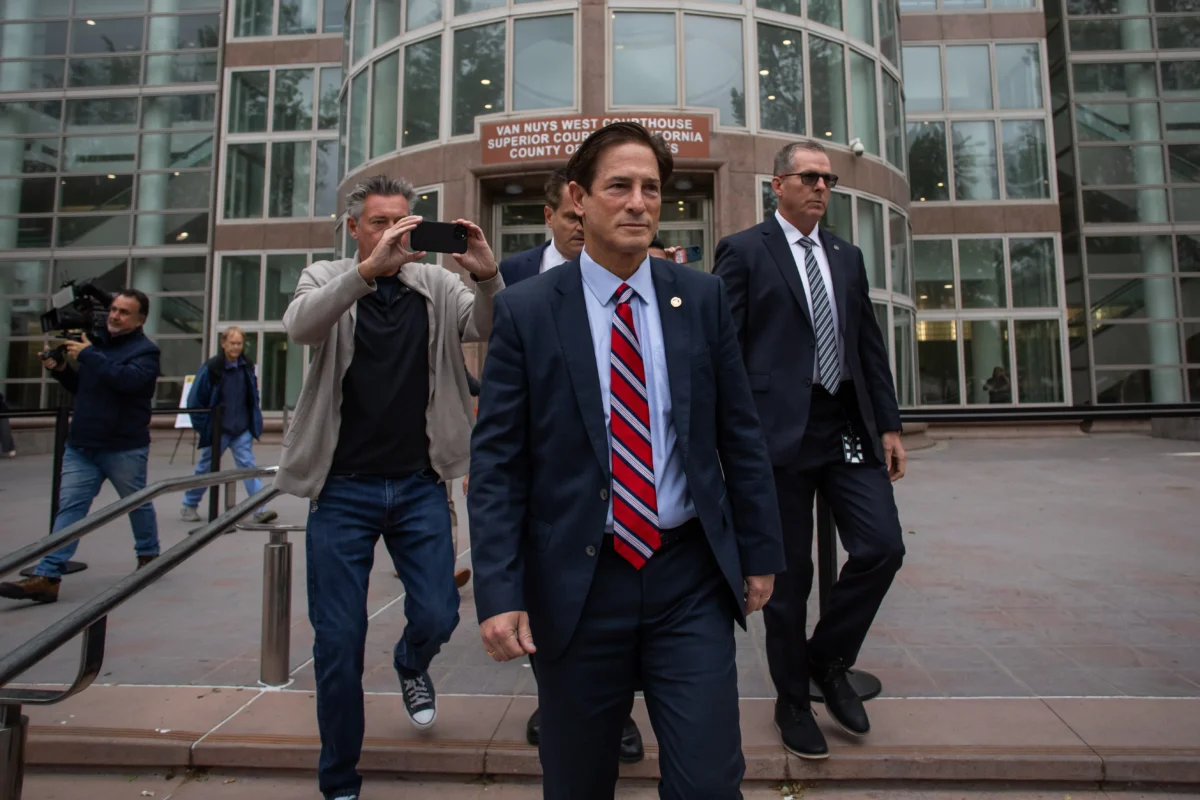 The Los Angeles County District Attorney Nathan J. Hochman walks to talk to the press in front of the Van Nuys West Courthouse before attending a resentencing hearing for Lyle and Erik Menendez, in Van Nuys, Calif., on April 17, 2025. (Apu Gomes/Getty Images)