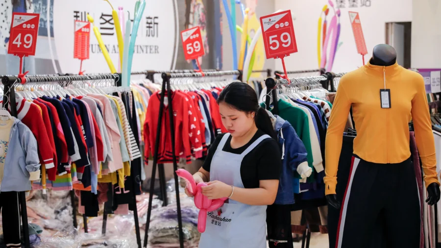 Chinese Consumer Spend on Discounted Goods as Factories Output Plummets