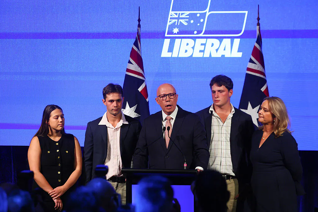 Australia's Opposition Leader Peter Dutton stands with his family as he concedes defeat in the general election at the Liberal Party election night event in Brisbane, Australia, on May 3, 2025. (Patrick Hamilton/AFP via Getty Images)