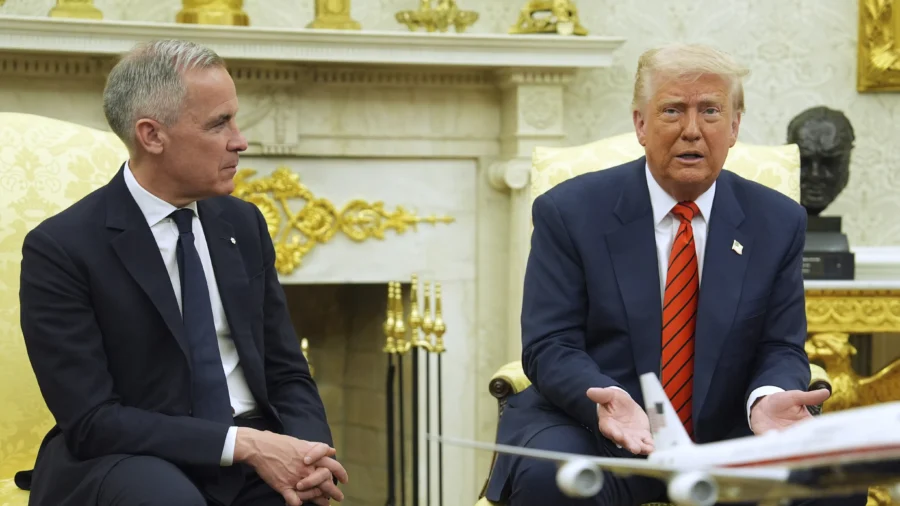 Trump Says ‘Never Say Never’ as Carney Tells Him Canada Not for Sale