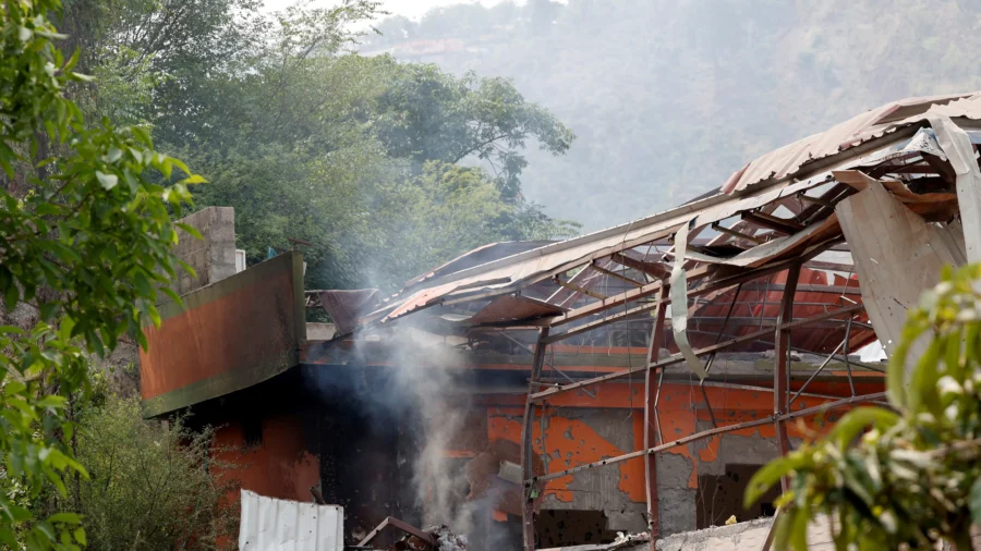 Pakistan Threatens to Respond After Indian Air Strikes Kill 26