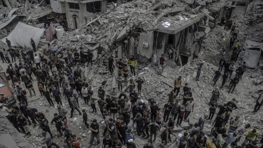 Residents Inspect Damage of Israeli Airstrike in Gaza