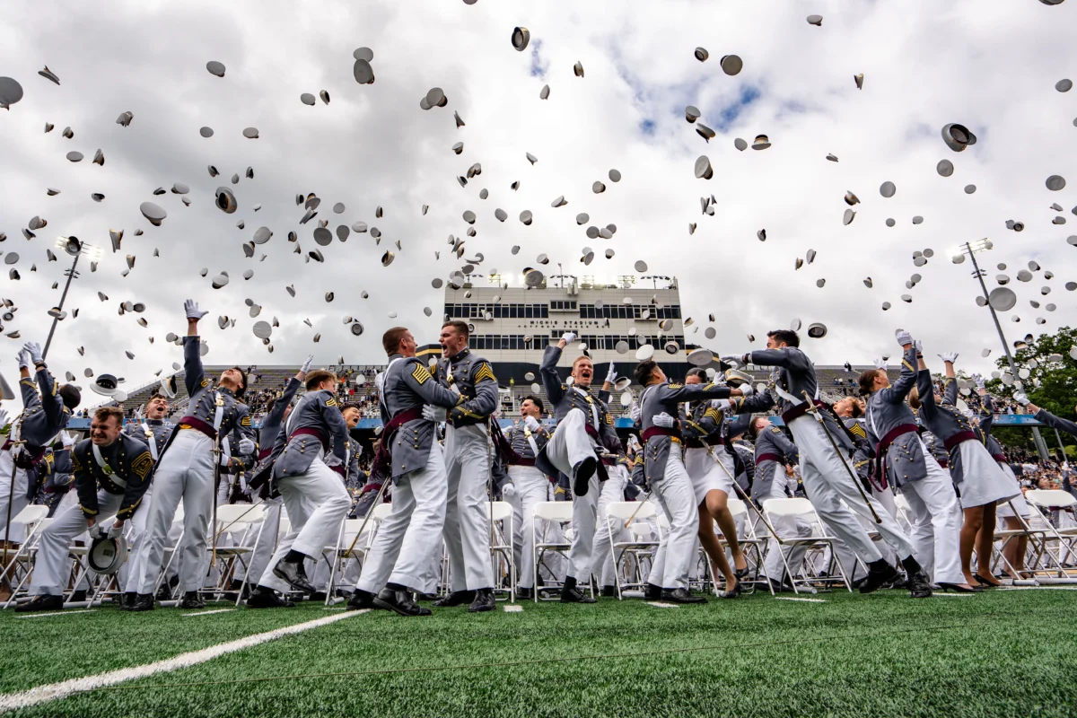 US Military Academy cadets throw their hats at the 2025 graduation ceremony at the United States Military Academy at West Point on May 24, 2025. (Samira Bouaou/The Epoch Times)