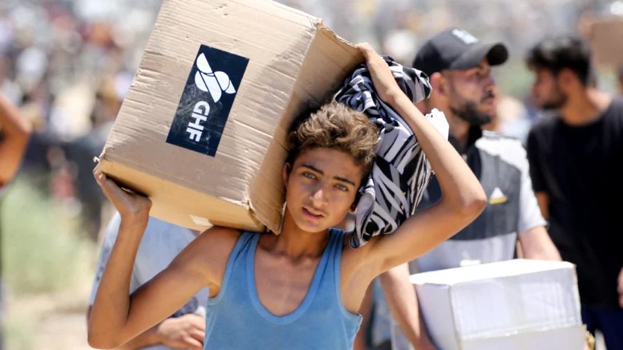 Gaza Residents Break Into Warehouse for Food