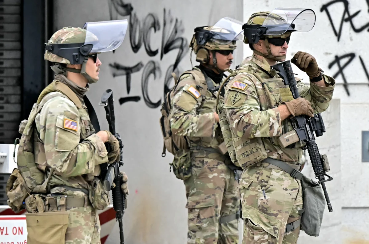 Members of the National Guard stand guard outside the Metropolitan Detention Center in downtown Los Angeles on June 8, 2025. (Frederic J. Brown/AFP via Getty Images)