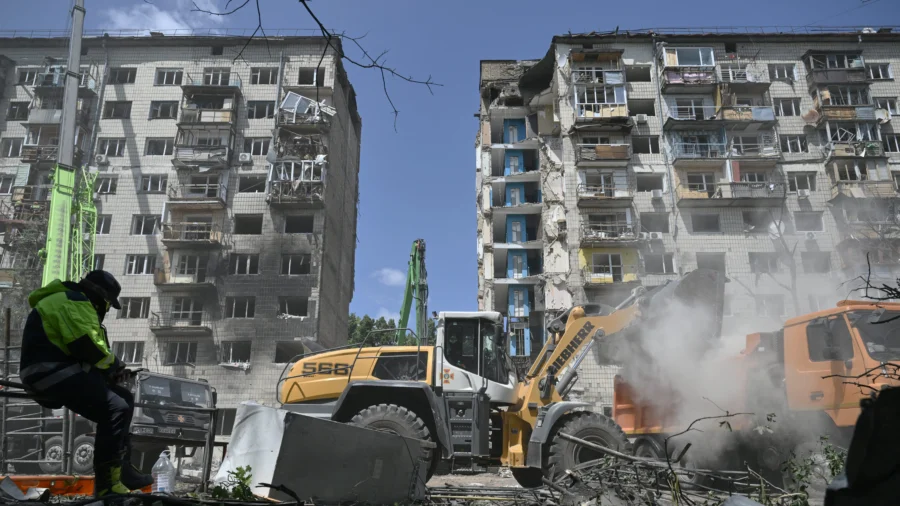 Kyiv Rescuers Continue to Find Bodies as Death Toll Climbs From Russian Attack