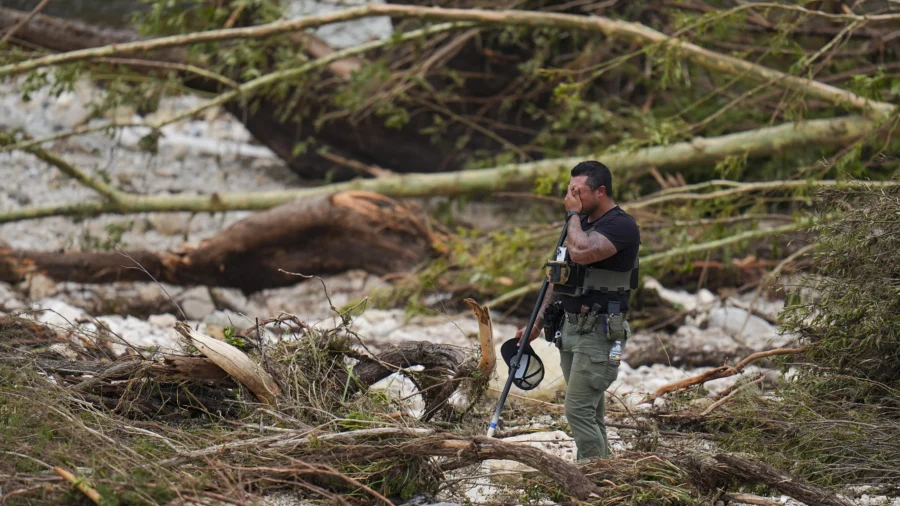 At Least 82 Killed in Texas Floods, 10 Girls From Christian Camp Still Missing; Trump Plans Visit