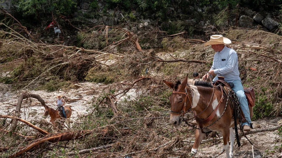 Texas Rescue Crews Face Harsh Conditions, More Rain