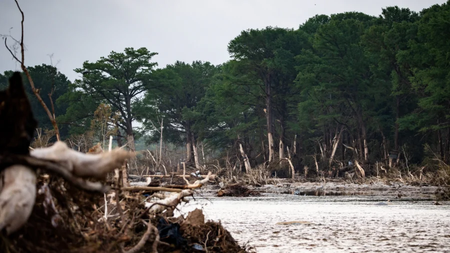 View of Damaged Homes, Debris Along Guadalupe River in Kerr County, Texas