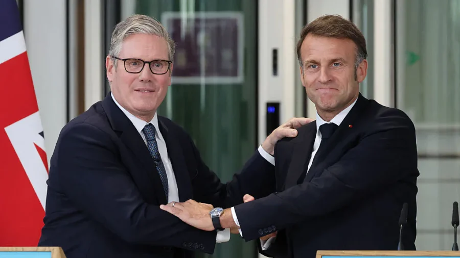 UK, France Discuss Cooperation, Tougher Controls on Illegal Immigration
