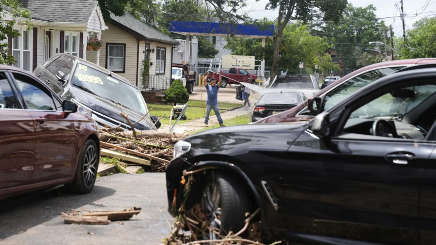Floods Hit East Coast as Wildfires Escalate Out West