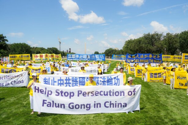 Falun Dafa practitioners gather for an annual rally calling for the end of the Chinese Communist Party’s ongoing persecution of Falun Gong in China, on the National Mall in Washington on July 17, 2025. (Samira Bouaou/The Epoch Times)