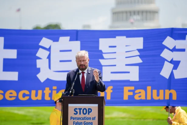 Greg Scarlatoiu, Executive Director of the Committee for Human Rights in North Korea, speaks during a Falun Dafa rally calling for the end of the Chinese Communist Party’s 26 years of persecution of Falun Gong in China, on the National Mall in Washington on July 17, 2025. (Madalina Kilroy/The Epoch Times)