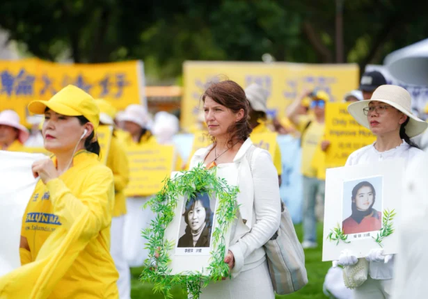 Falun Dafa practitioners gather for an annual rally calling for the end of the Chinese Communist Party’s ongoing persecution of Falun Gong in China, on the National Mall in Washington on July 17, 2025. (Samira Bouaou/The Epoch Times)