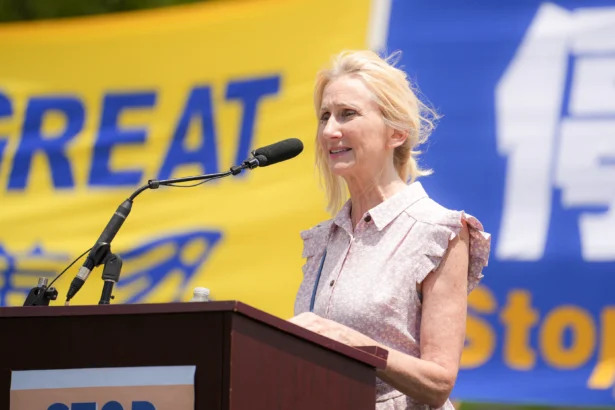 Wendy Wright, President of the Christian Freedom International speaks during a Falun Dafa rally calling for the end of the Chinese Communist Party’s 26 years of persecution of Falun Gong in China, on the National Mall in Washington on July 17, 2025. (Madalina Kilroy/The Epoch Times)