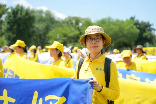 Teresa Zhang attends an annual rally calling for the end of the Chinese Communist Party’s ongoing persecution of Falun Gong in China, on the National Mall in Washington on July 17, 2025. (Samira Bouaou/The Epoch Times)