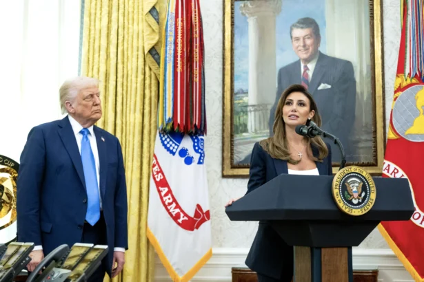 President Donald Trump looks on as Alina Habba speaks (R) during a swearing-in ceremony as U.S. Attorney General for New Jersey, in the Oval Office of the White House on March 28, 2025. (Saul Loeb/AFP via Getty Images)
