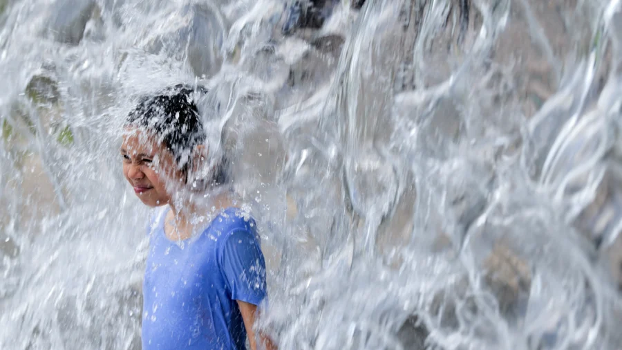 Heat Alerts Stretch Across the Nation as Storms, Fires Add to Summer Threats