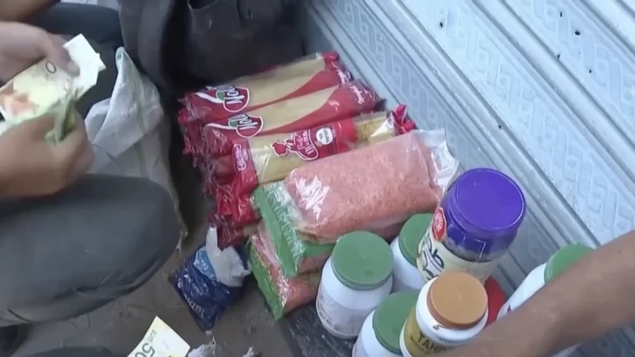 Gaza Strip Residents Swarm Truck Carrying Aid