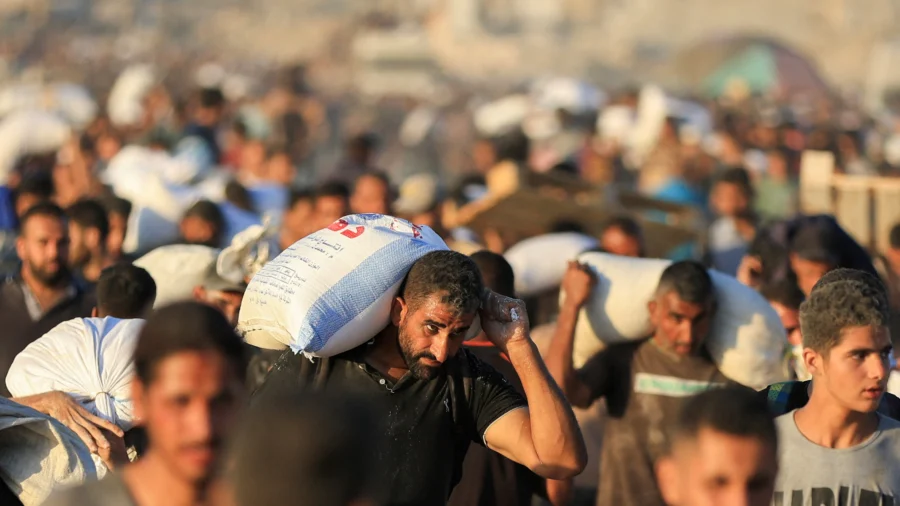 Residents Scramble for Food Inside Gaza Strip