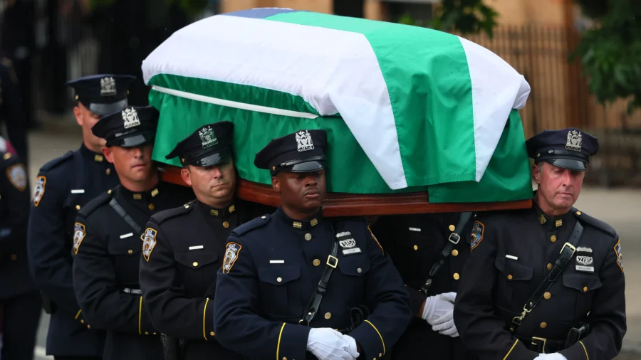 Mourners Honor NYPD Officer Killed in Attack at NFL Headquarters Building