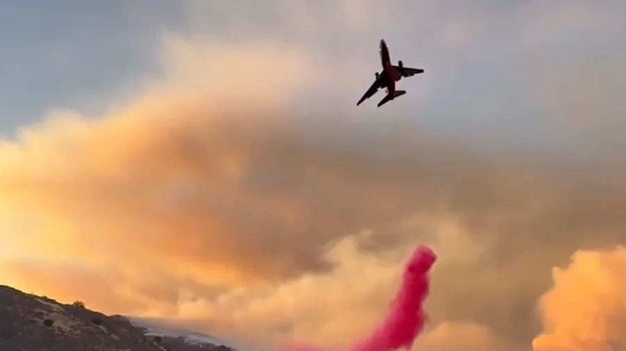 Wildfires Rage Across West, Canadian Smoke Reaches New York