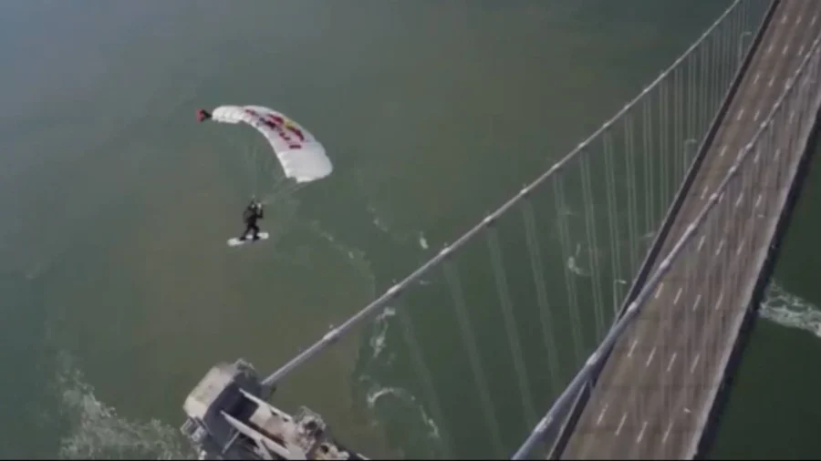 Skydiver Railslides Down San Francisco Bay Bridge