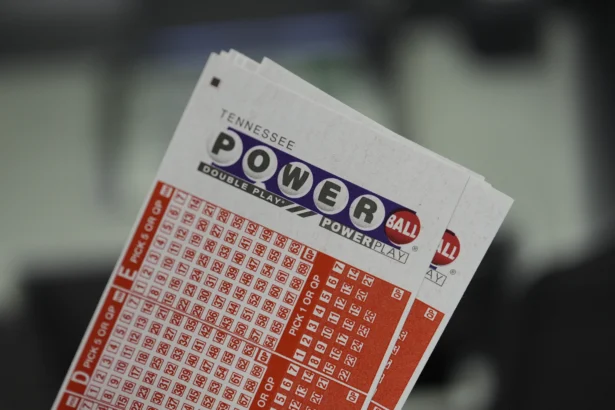 Several Powerball play slips are seen on Friday, Aug. 29, 2025, in Nashville, Tenn. (AP Photo/George Walker IV)