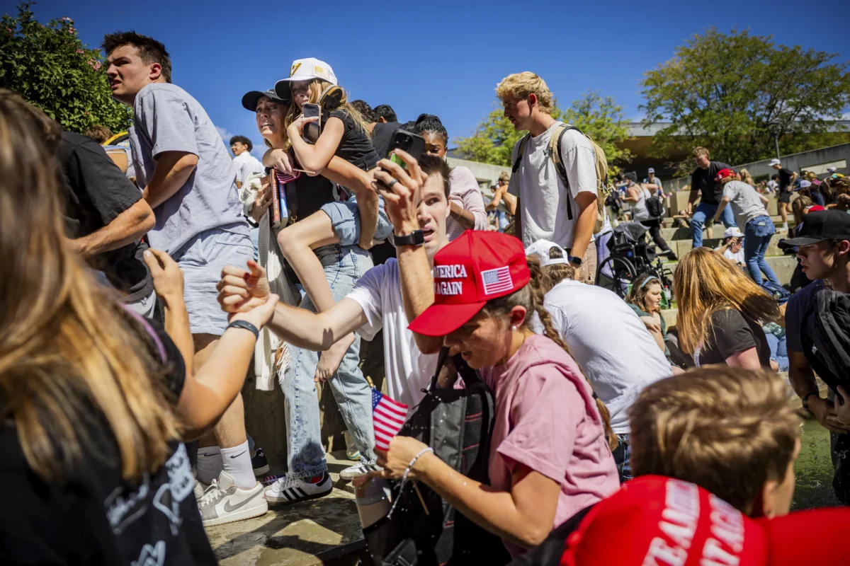 The crowd reacts after Charlie Kirk, the CEO and co-founder of the conservative youth organization Turning Point USA, is shot at the Utah Valley University in Orem, Utah, on Sept. 10, 2025. (Tess Crowley/The Deseret News via AP)