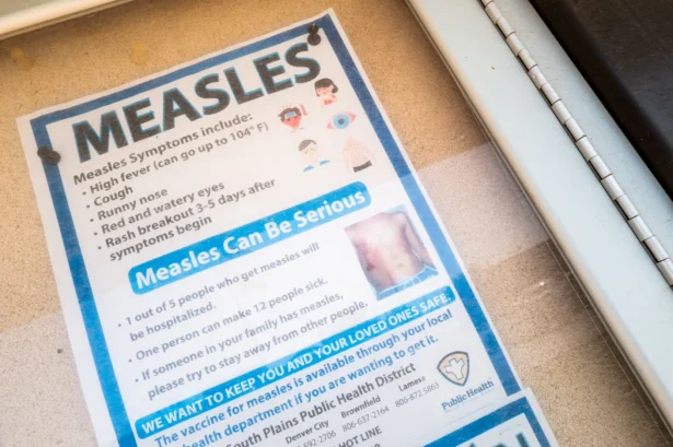 A measles advisory is displayed on a bulletin board outside the Gaines County Courthouse in Seminole, Texas, on April 9, 2025. (Brandon Bell/Getty Images)